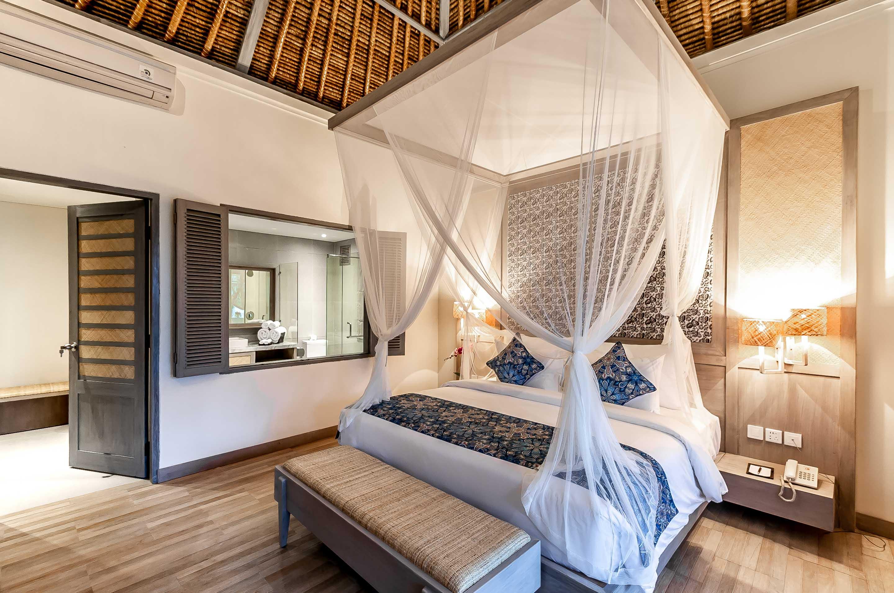 Nirwana Beach & Resort Candidasa Kültér fotó A bedroom at the resort