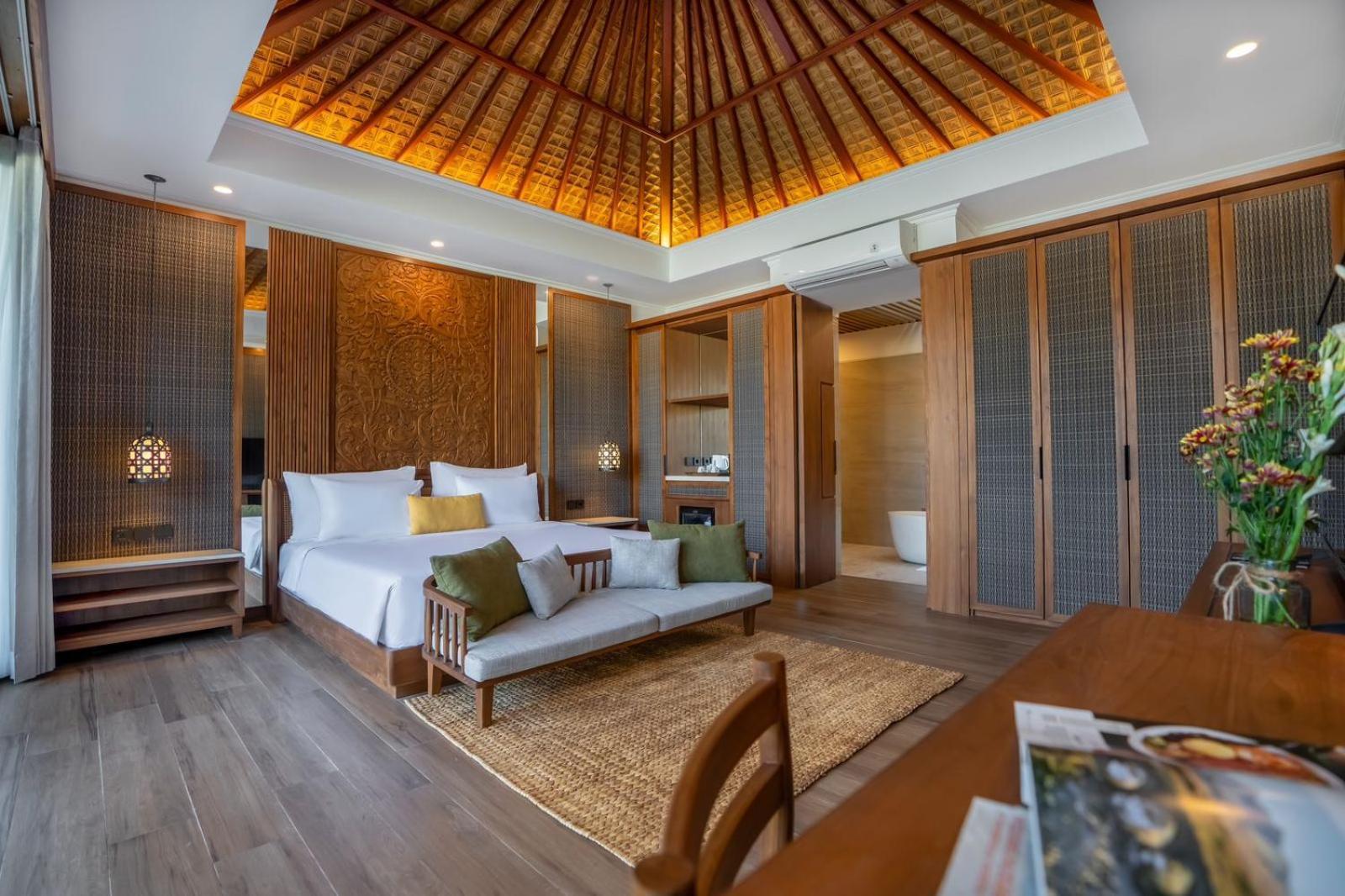 Nirwana Beach & Resort Candidasa Kültér fotó A bedroom at the resort